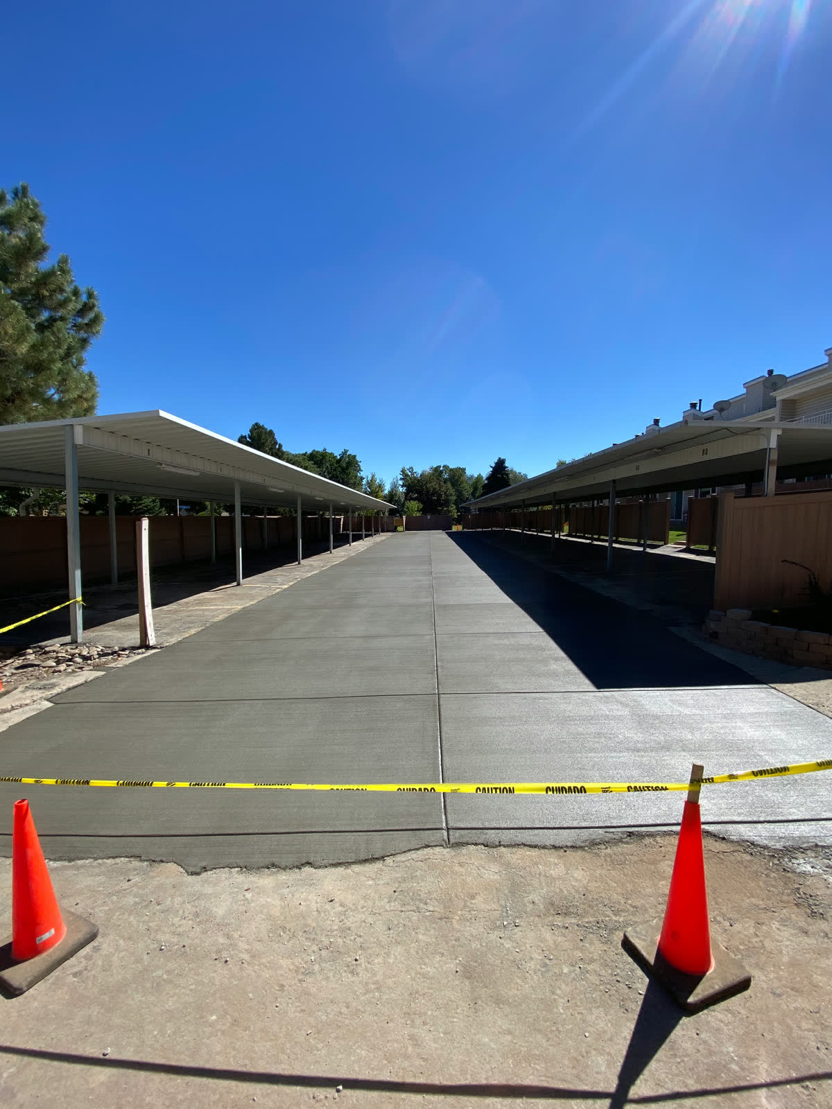 The same HOA parking lot after the new concrete pour