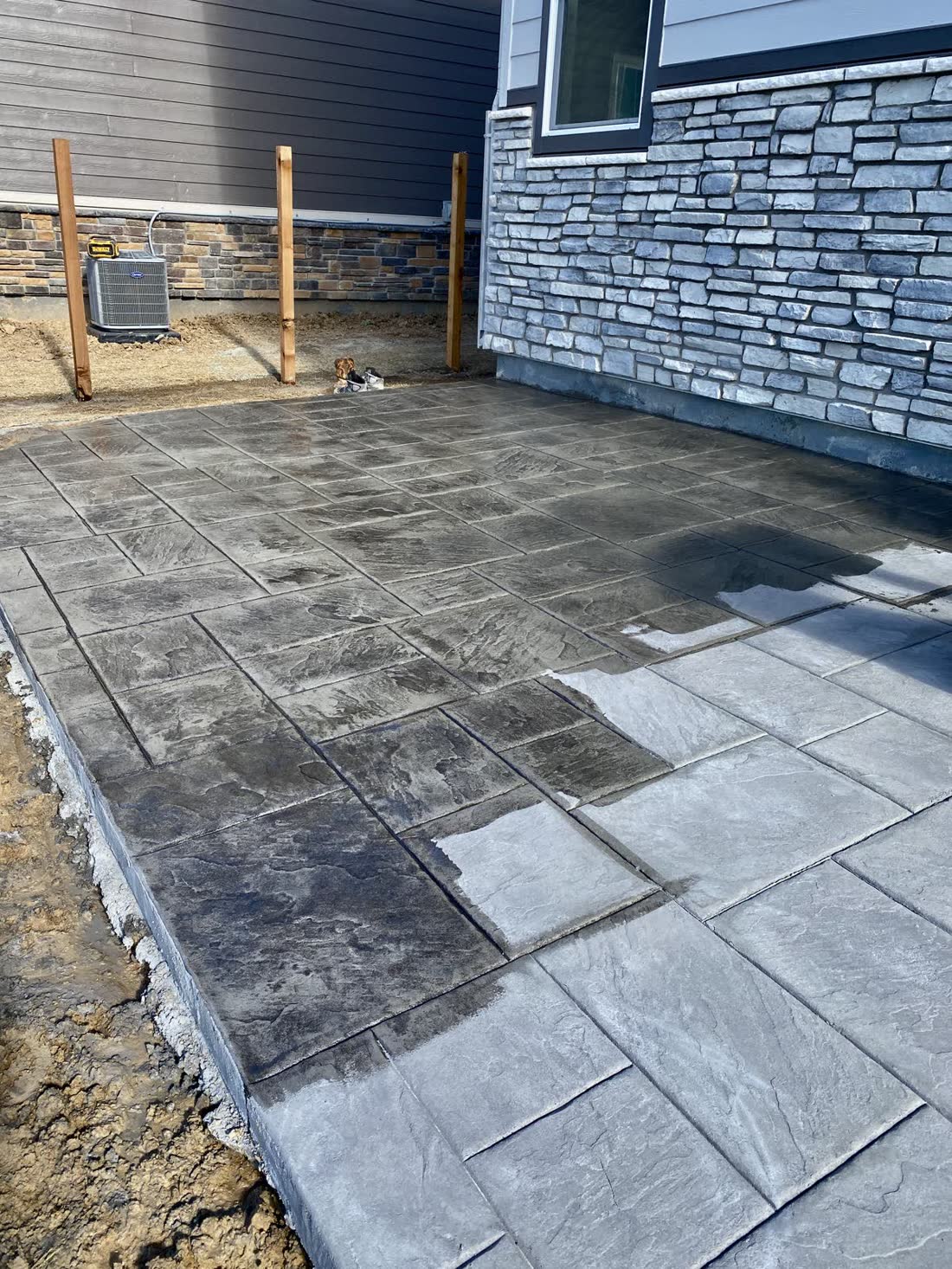Stamped slate patio with the forms still in place